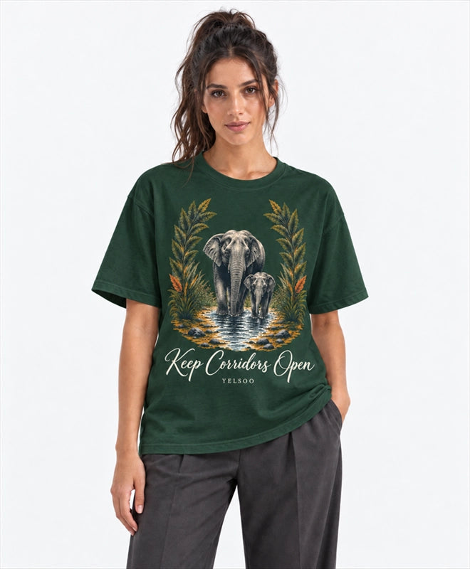 YELSOO men's Big & Tall Keep Corridors Open Asian Elephant Graphic Tee in Forest Green — front model view
