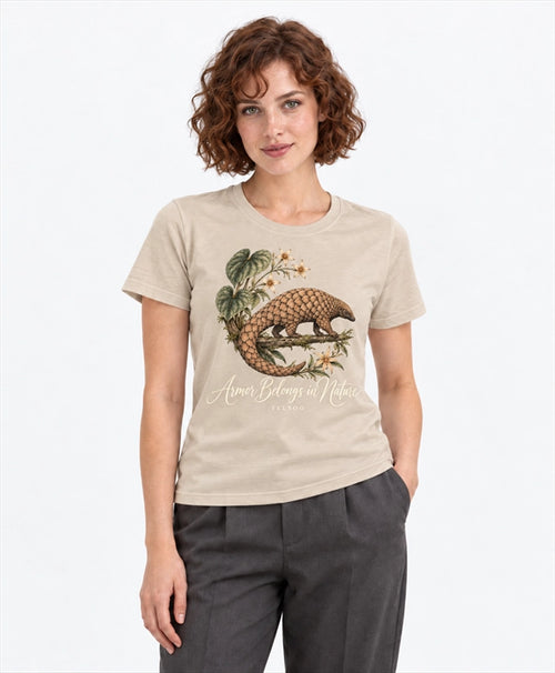 YELSOO women's Armor Belongs in Nature Pangolin Graphic Tee in Oat Beige — front model view