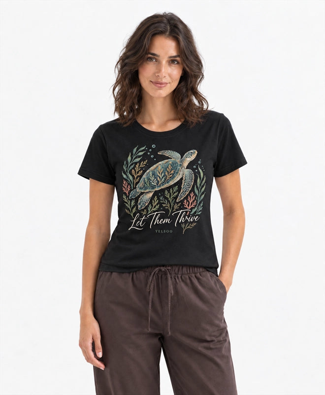 YELSOO women's Let Them Thrive Sea Turtle Graphic Tee in Black — front model view