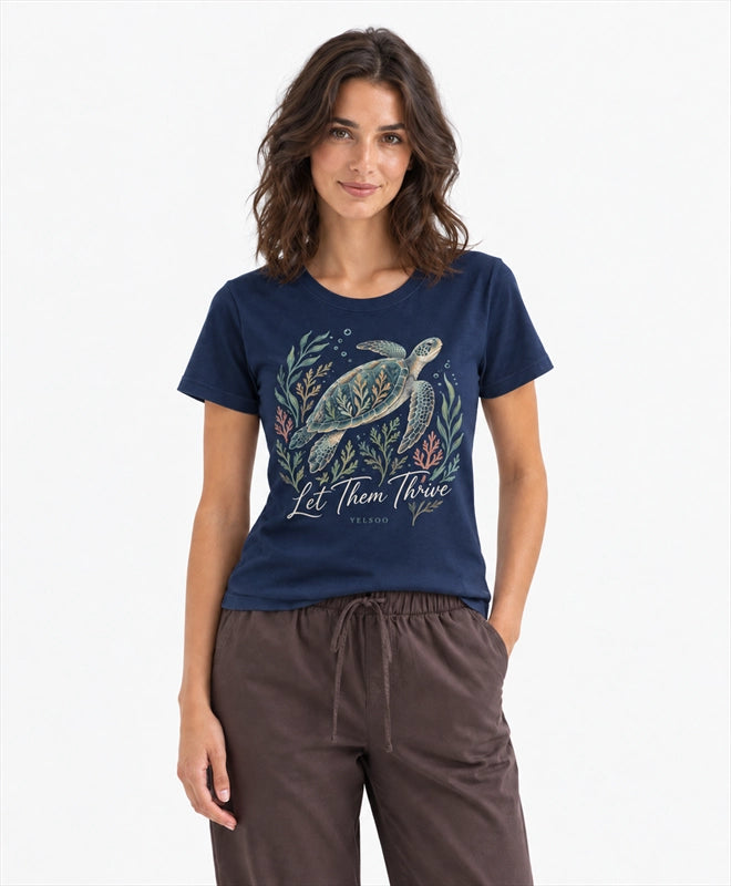 YELSOO women's Let Them Thrive Sea Turtle Graphic Tee in Navy — front model view