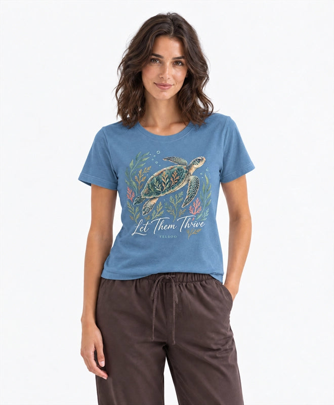 YELSOO women's Let Them Thrive Sea Turtle Graphic Tee in Ocean Blue — front model view