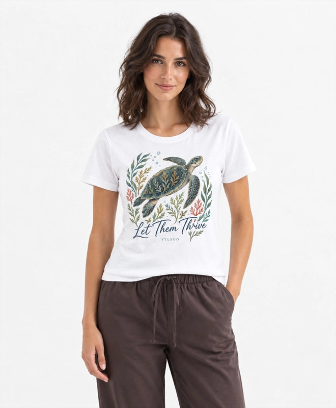 YELSOO women's Let Them Thrive Sea Turtle Graphic Tee in White — front model view