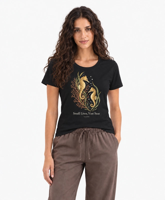 YELSOO women's Small Lives Vast Seas Seahorse Graphic Tee in Black — front model view