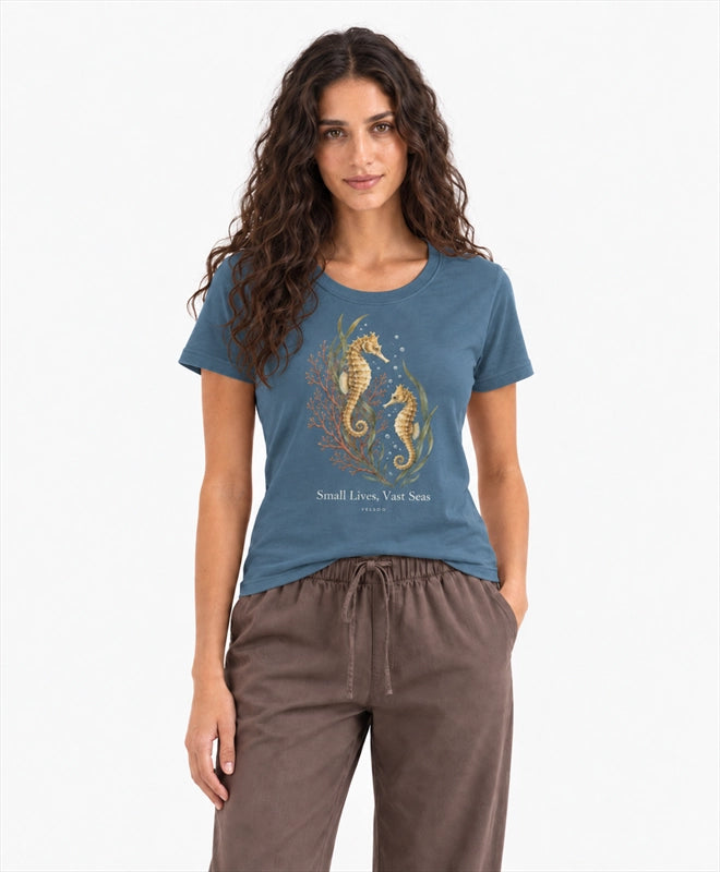 YELSOO women's Small Lives Vast Seas Seahorse Graphic Tee in Deep Sea Blue — front model view