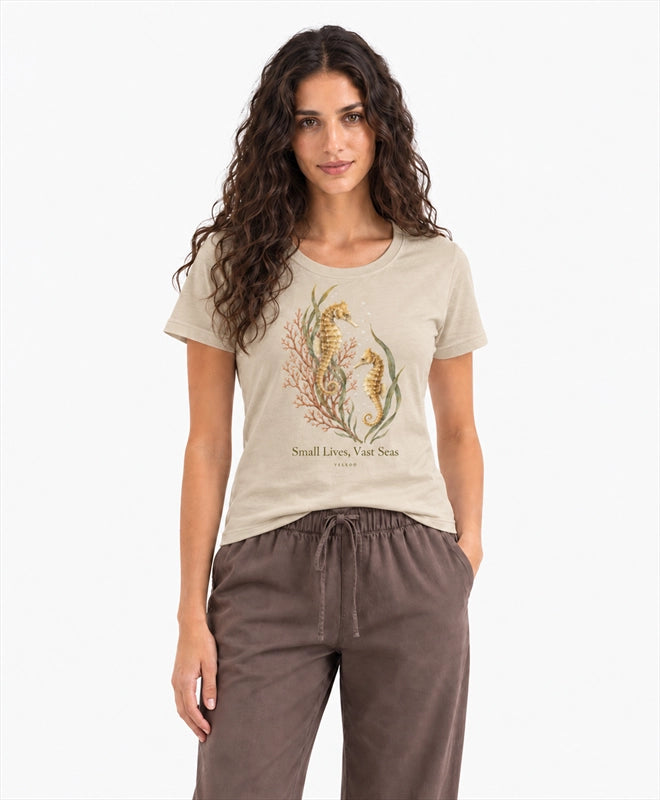 YELSOO women's Small Lives Vast Seas Seahorse Graphic Tee in Light Sand — front model view
