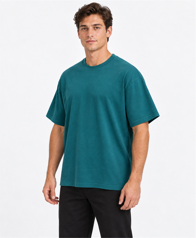 YELSOO Essential Crewneck Tee — Transformative Teal — men's model, three-quarter view