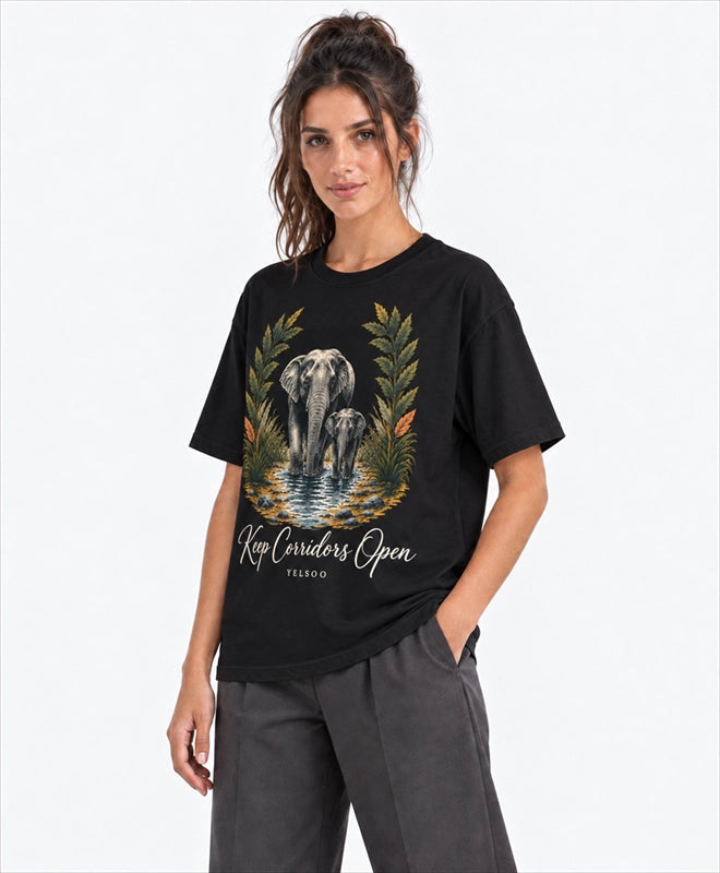 YELSOO men's Big & Tall Keep Corridors Open Asian Elephant Graphic Tee in Black — three-quarter model view