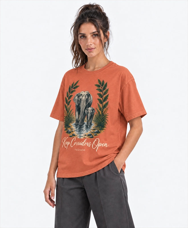 YELSOO men's Big & Tall Keep Corridors Open Asian Elephant Graphic Tee in Terracotta — three-quarter model view