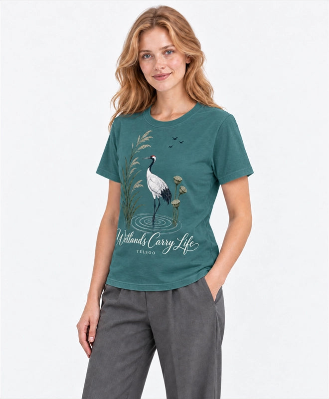 YELSOO men's Wetlands Carry Life Red-Crowned Crane Graphic Tee in Soft Teal — three-quarter model view