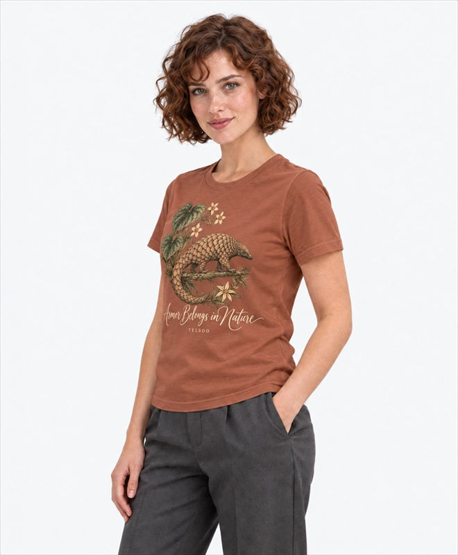 YELSOO women's Armor Belongs in Nature Pangolin Graphic Tee in Clay Brown — three-quarter model view