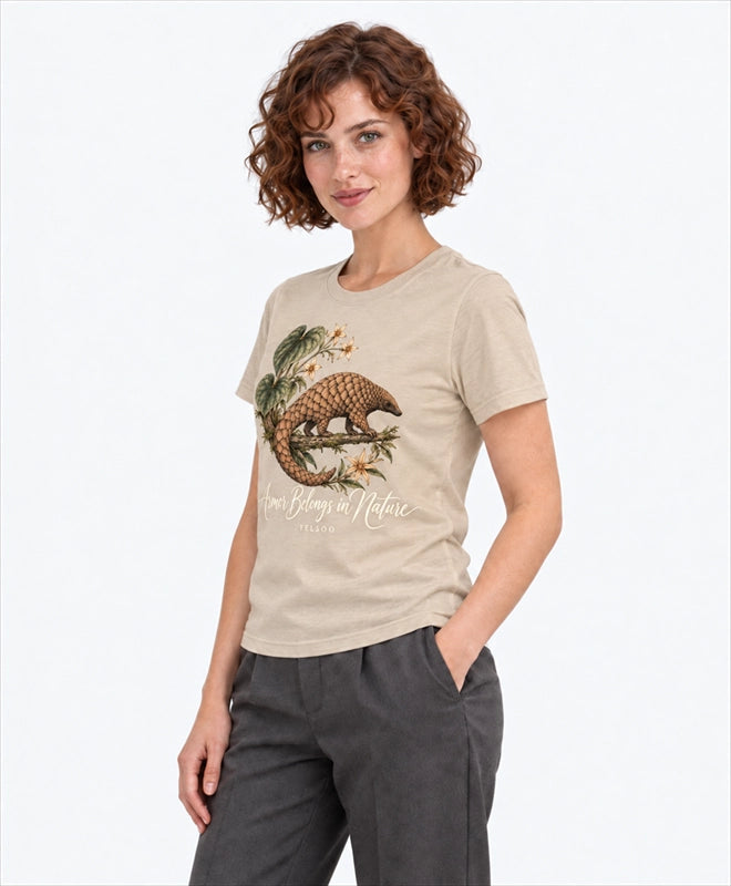 YELSOO women's Armor Belongs in Nature Pangolin Graphic Tee in Oat Beige — three-quarter model view