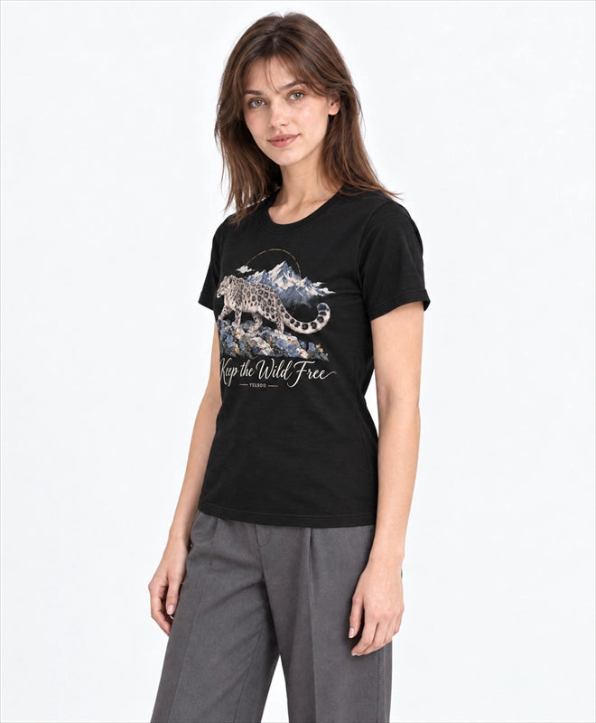 YELSOO women's Keep the Wild Free Snow Leopard Graphic Tee in Black — three-quarter model view