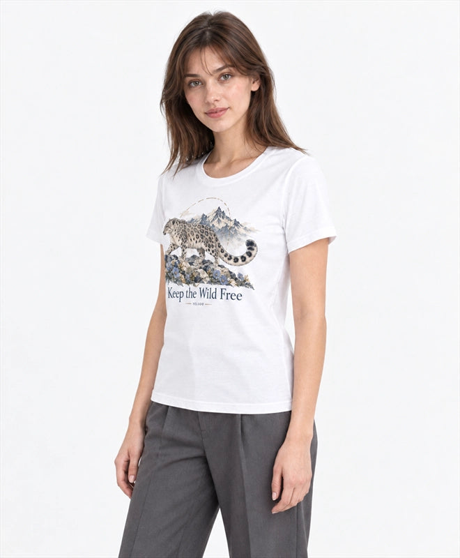 YELSOO women's Keep the Wild Free Snow Leopard Graphic Tee in White — three-quarter model view