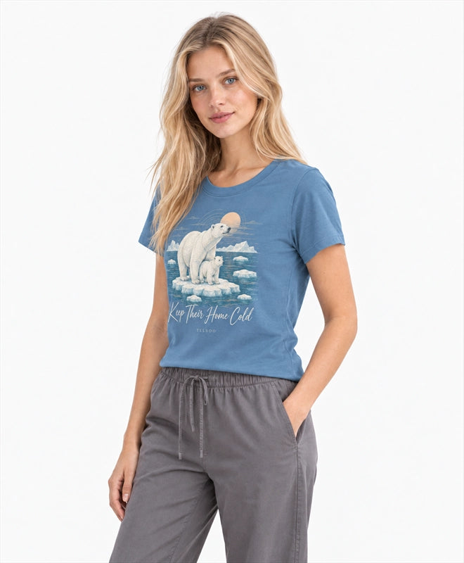 YELSOO women's Keep Their Home Cold Polar Bear Graphic Tee in Mist Blue — three-quarter model view