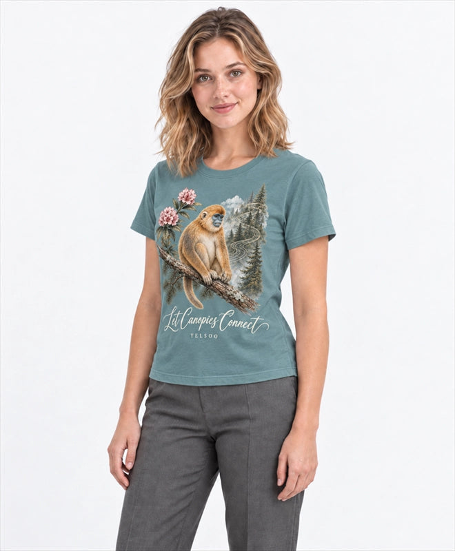 YELSOO women's Let Canopies Connect Golden Snub-Nosed Monkey Graphic Tee in Soft Teal — three-quarter model view