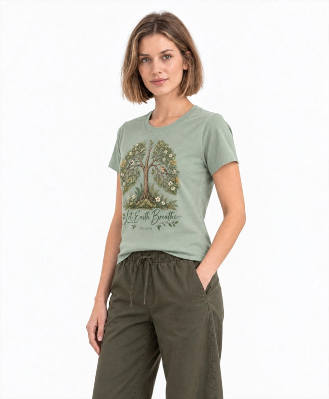 YELSOO women's Let Earth Breathe Forest Graphic Tee in Sage Green — three-quarter model view