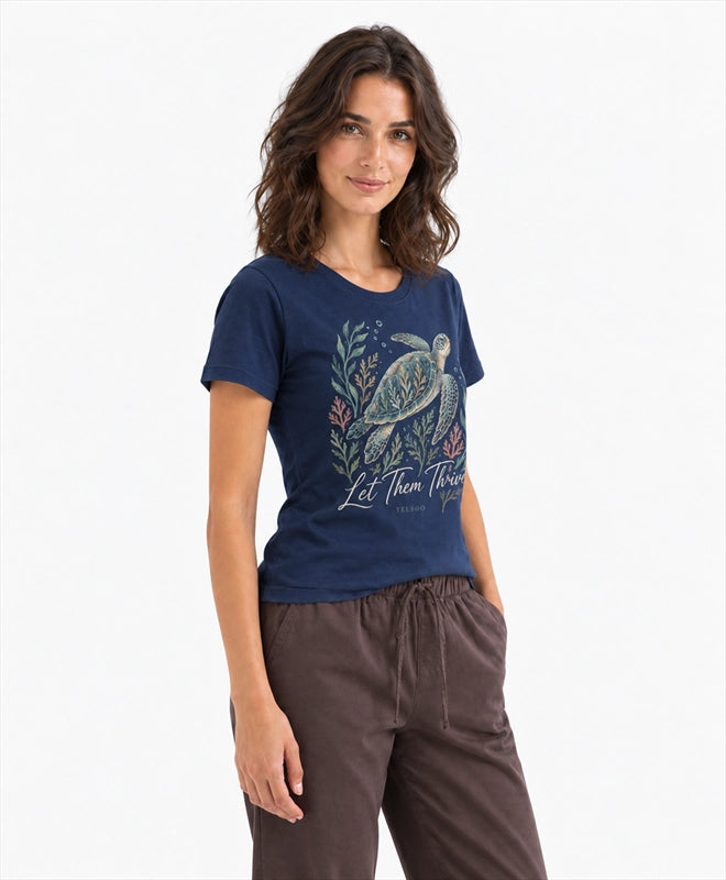 YELSOO women's Let Them Thrive Sea Turtle Graphic Tee in Navy — three-quarter model view