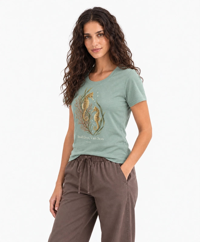 YELSOO women's Small Lives Vast Seas Seahorse Graphic Tee in Sea Salt Green — three-quarter model view