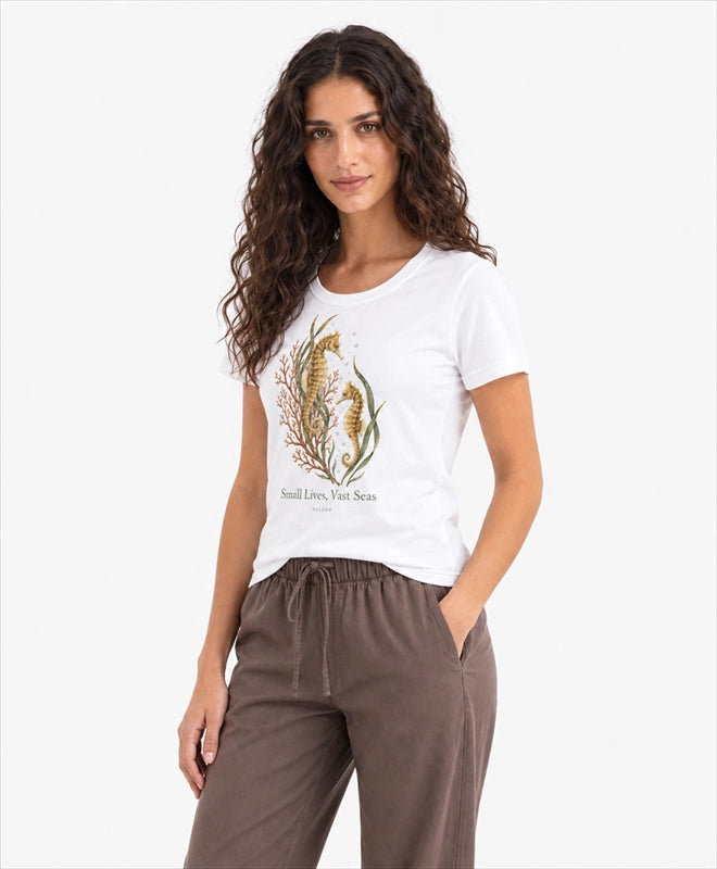 YELSOO women's Small Lives Vast Seas Seahorse Graphic Tee in White — three-quarter model view