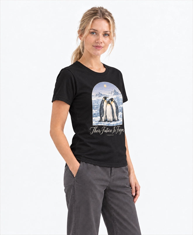 YELSOO women's Their Future is Frozen Emperor Penguin Graphic Tee in Black — three-quarter model view