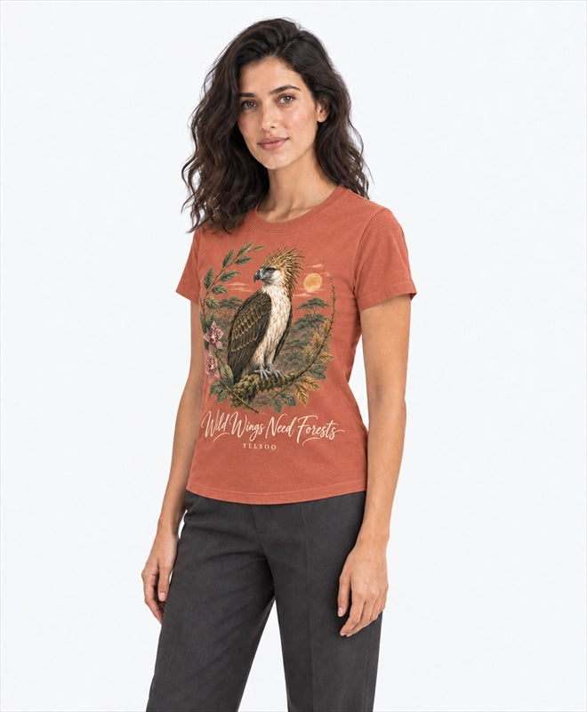 YELSOO women's Wild Wings Need Forests Philippine Eagle Graphic Tee in Terracotta — three-quarter model view