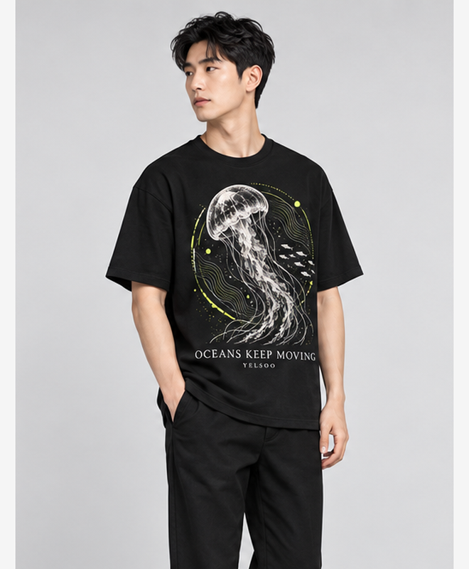 Oceans Keep Moving Graphic Tee — men's model, three-quarter view