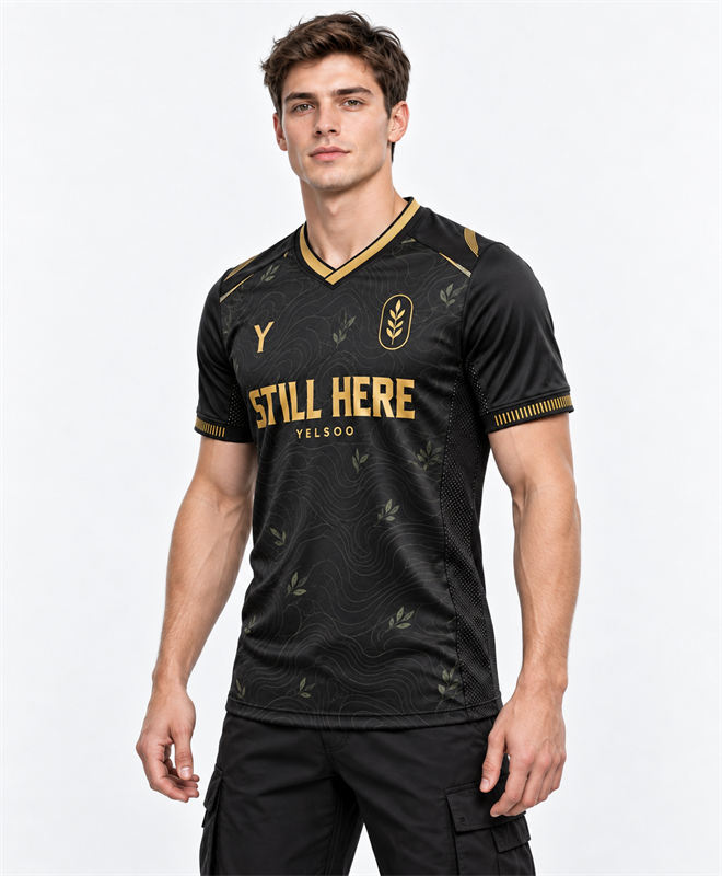 YELSOO Unisex Still Here Jersey in black gold — model angle view